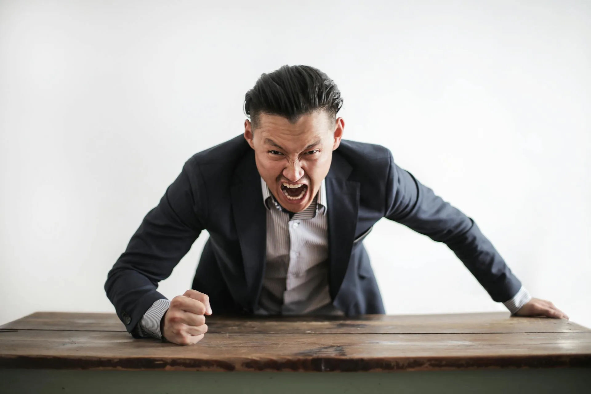 Conquer Stress Like a Man: Powerful Techniques for Improved Wellbeing a man in a suit and tie